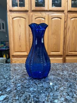 Vintage 7 inches tall Cobalt Blue  Vase.  Preowned excellent conditions no cracks or chips.  Has been on display in a cabinet.  Smoke free home