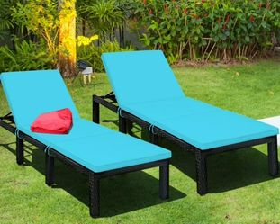 Set Of Two Lounge Chairs With Blue Cushions