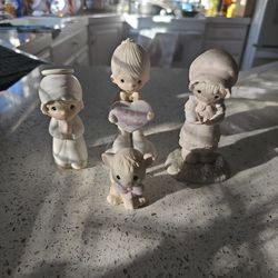 4 Precious Moments Figurines