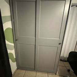 IKEA HAUGA Wardrobe with sliding doors