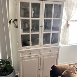 white wooden china cabinet