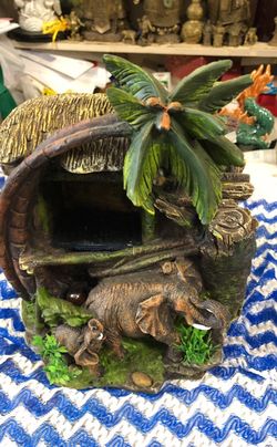 Wall fountain with elephants