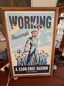 Plumbers 2004 original American Standard working towards a clogged free nation advertising poster professionally set in solid wood frame no rips tears