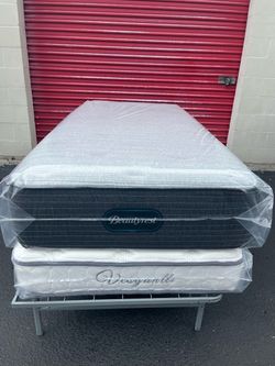 Brand new twin-size plush Beautyrest Mattress in plastic