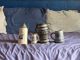 German collector mugs. Plus lighter.