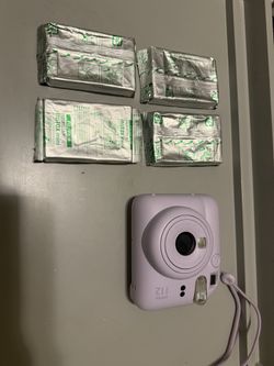 Instax Mini 12 - Camera (Lavender ) + (4) New - Used