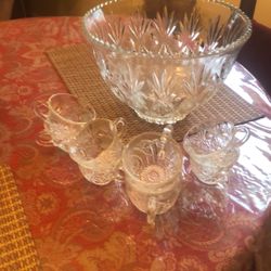 Punch bowl with 8 cups. Antique.