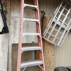 2 8ft Ladders And 1 24”ft Extended 