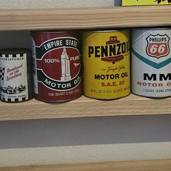Antique oil cans