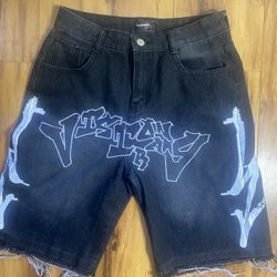 Black and White ripped denim shorts