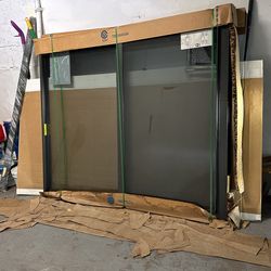 2 Brand New Bronze PGT Impact Windows