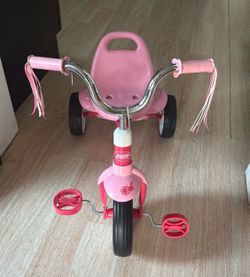 Pink tricycle