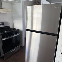 Apartment Size Refrigerator And Gas Stove Like New Only A Year Old 