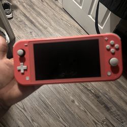 Nintendo Switch Lite (Coral Pink) + Game & SD Card Bundle