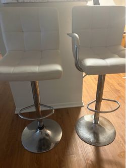 Pair of white bar stools