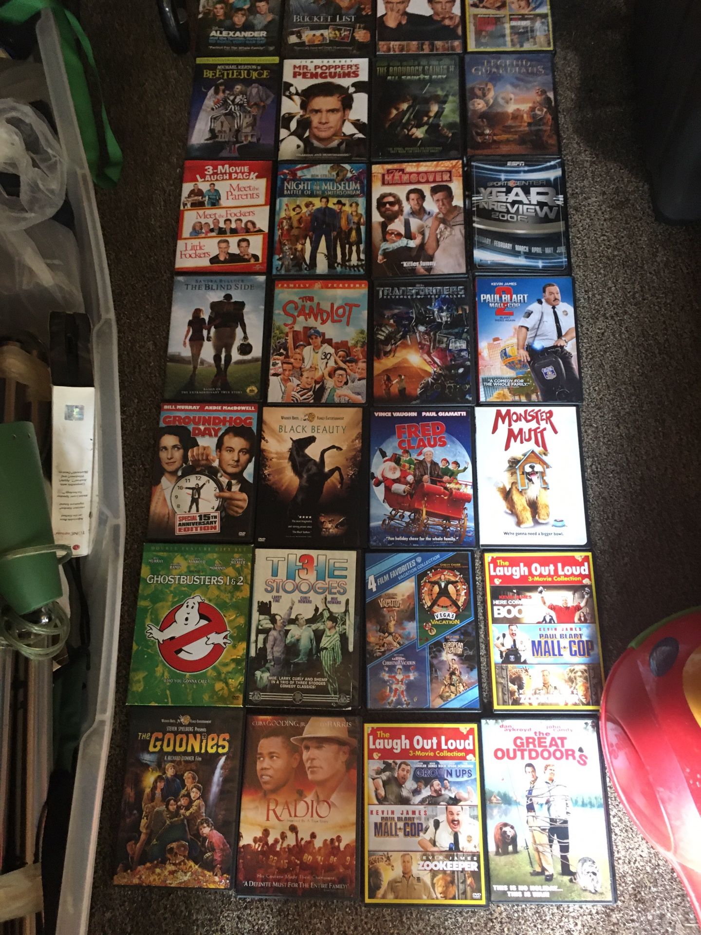 Lots of DVD movies in cases only three dollars each