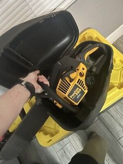 Poulan pro chainsaw with case.