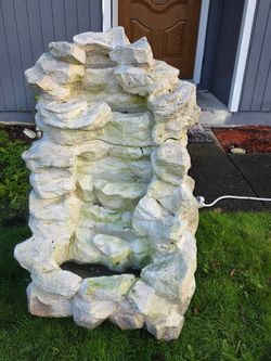 Water Fountain And Driftwood