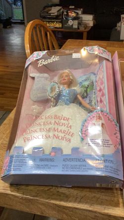 Barbie doll receive two dolls
