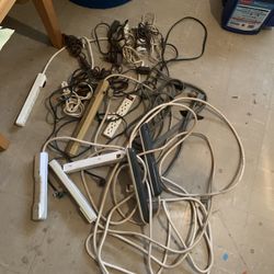 Large assortment of extension cords, Appliance cords, and power strips 