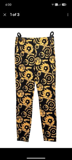 Black and yellow leggings, size M
