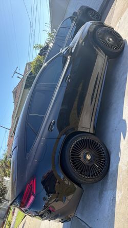 24 Inch Trimestre M Gloss Black Floating Cap Forgiato Rims Like New.