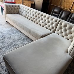 tufted, L-shaped sectional sofa with a chaise lounge. *champagne color* 