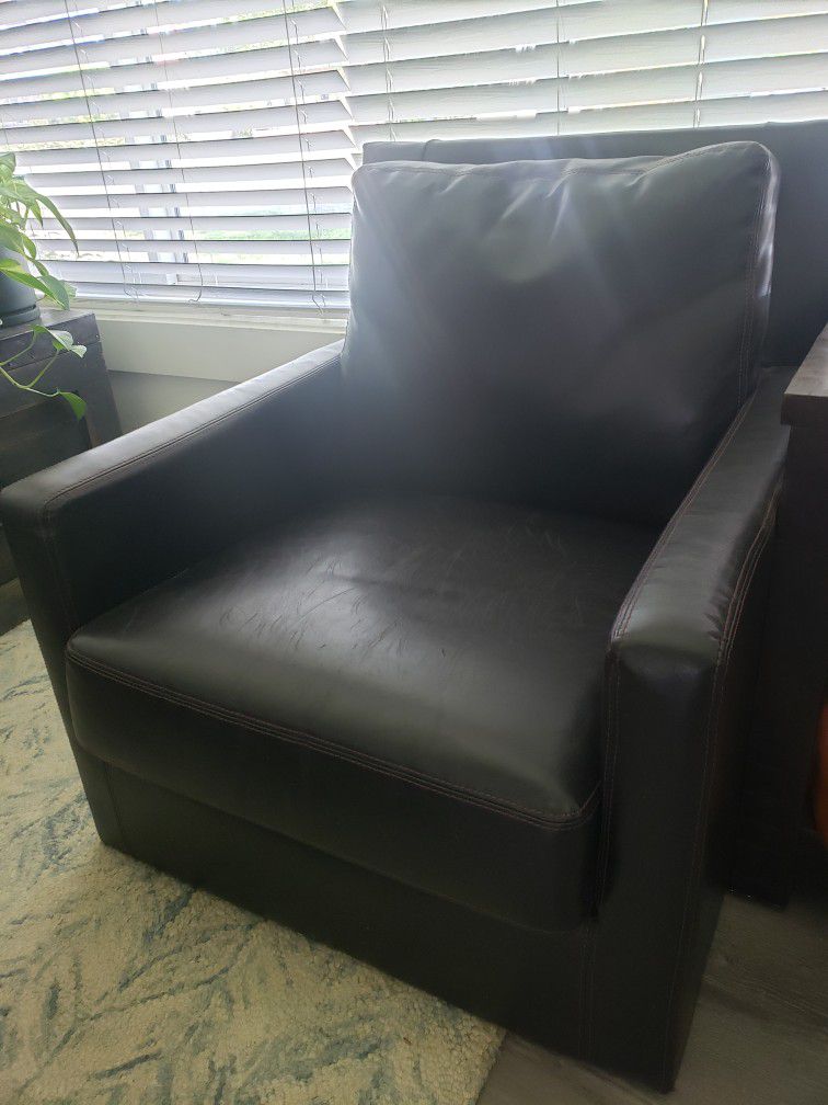 2 Brown Leather Chairs