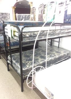 Twin over twin bunk beds with mattresses