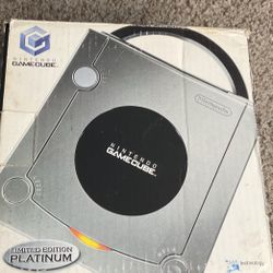 NINTENDO GAMECUBE WITH ALL ORIGINAL GAMES AND CONTROLLERS ALSO ORIGINAL CABLES 