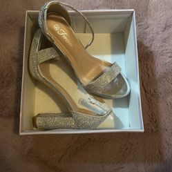 Woman’s Size 8.5 Silver Heels 
