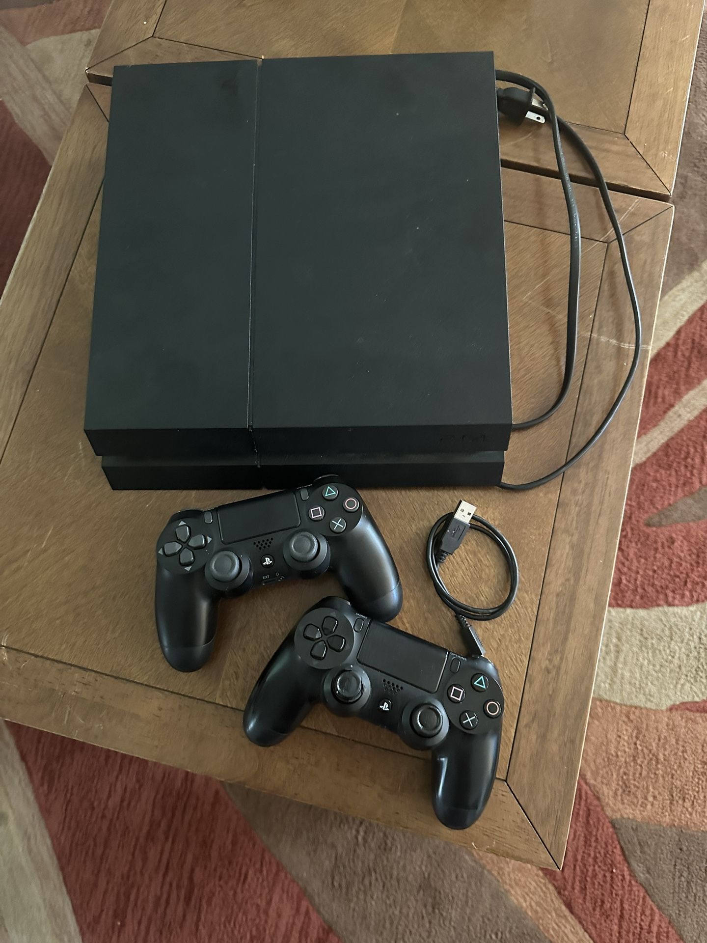 PS4 1TB + 2 Controllers + Games