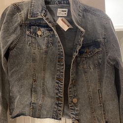 jean jacket. adult M. NEVER USED!! tags still on. IN A RUSH TO SELL