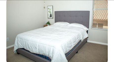 Beautiful grey headboard bed