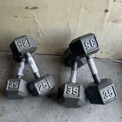 New pair of 25 and 35lb iron dumbbells