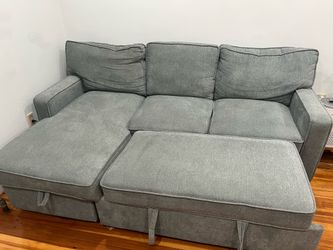 L-shaped sectional sleeper sofa, charging ports, a storage chaise and cup holders.
