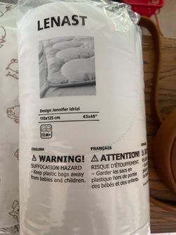 Crib duvet insert and cover.