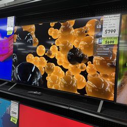 OLED LG 55 inch 4K Smart TV with HDR and Dolby Vision! Includes Store Warranty And Financing!