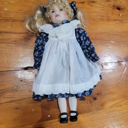 17" Porcelain Doll With Blonde Pigtails, Blue Eyes, Blue And White Dress