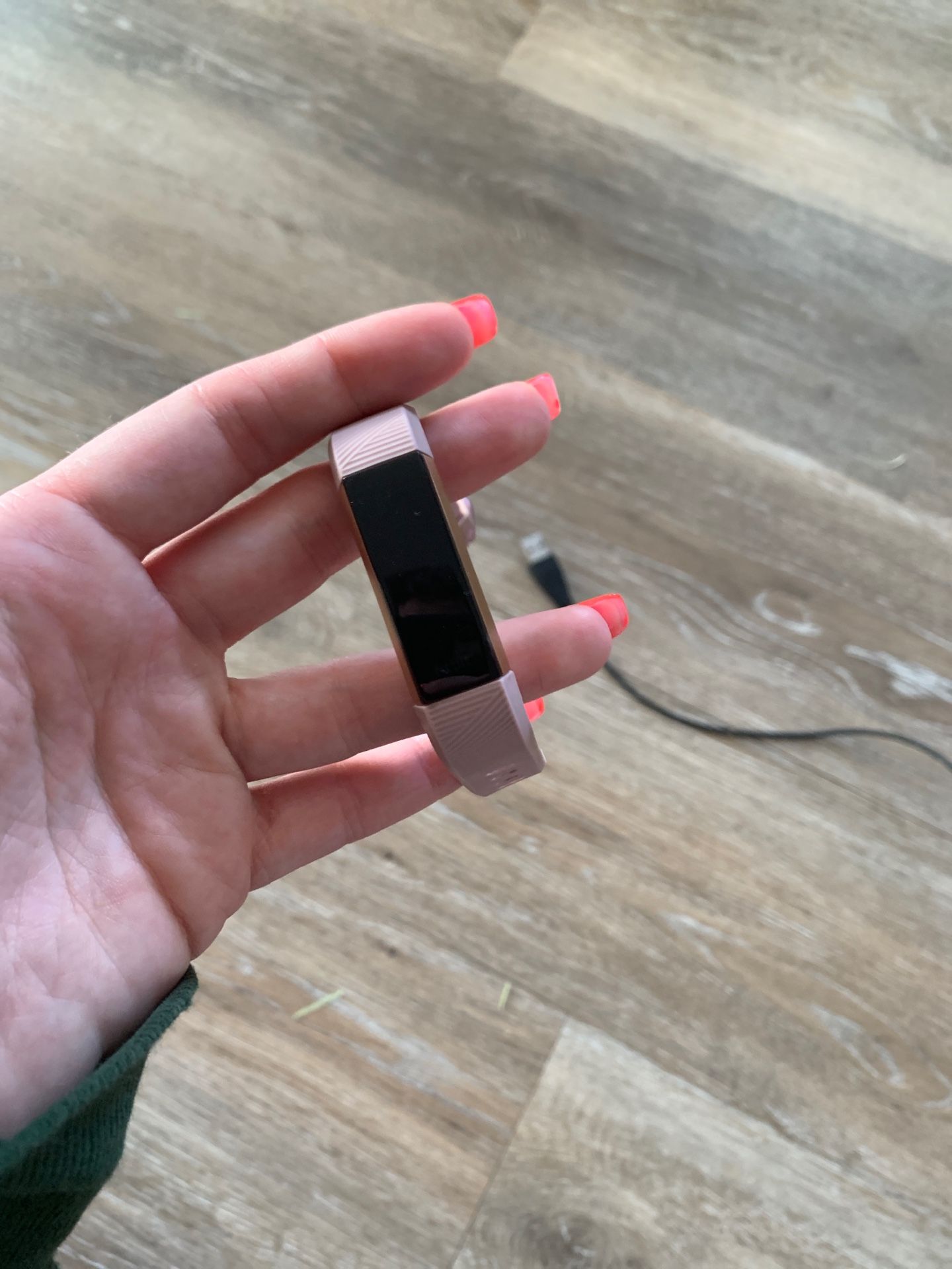 Rose gold Fitbit