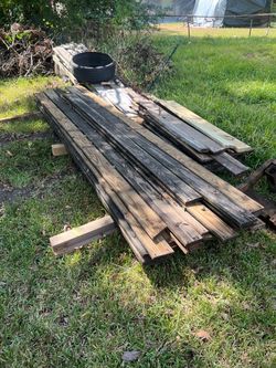 Used treated lumber bundle of planks