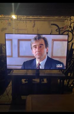 65” TCL Smart Television with Remote and 14-Day Warranty