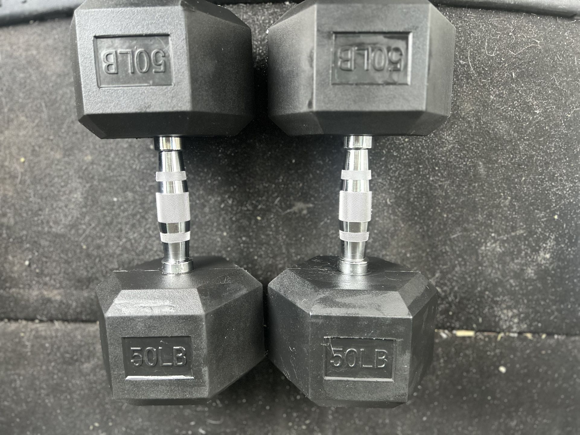 Two 50 pound Dumbbells