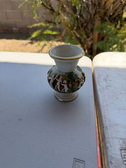 Vintage Capodimonte porcelain vase from Italy, featuring hand-painted relief cherubs and gold trim