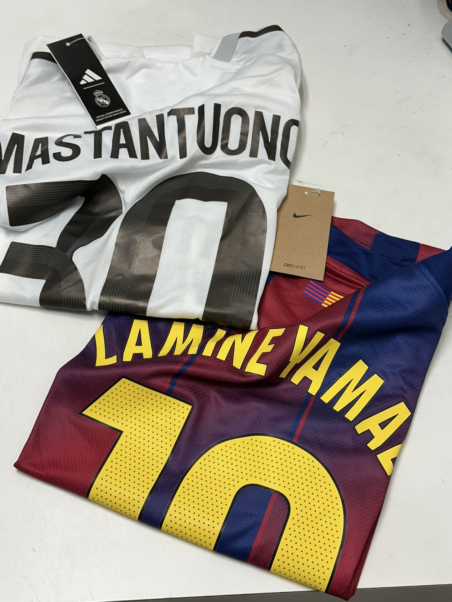 BUNDLE REAL MADRID-BARCELONA TWO JERSEYS. ANYTHING ASSORTED. PROMO SUPER CLASICO OCT 26.