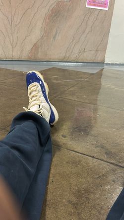 Air Jordan 11 Low Blue/Cream Sneakers