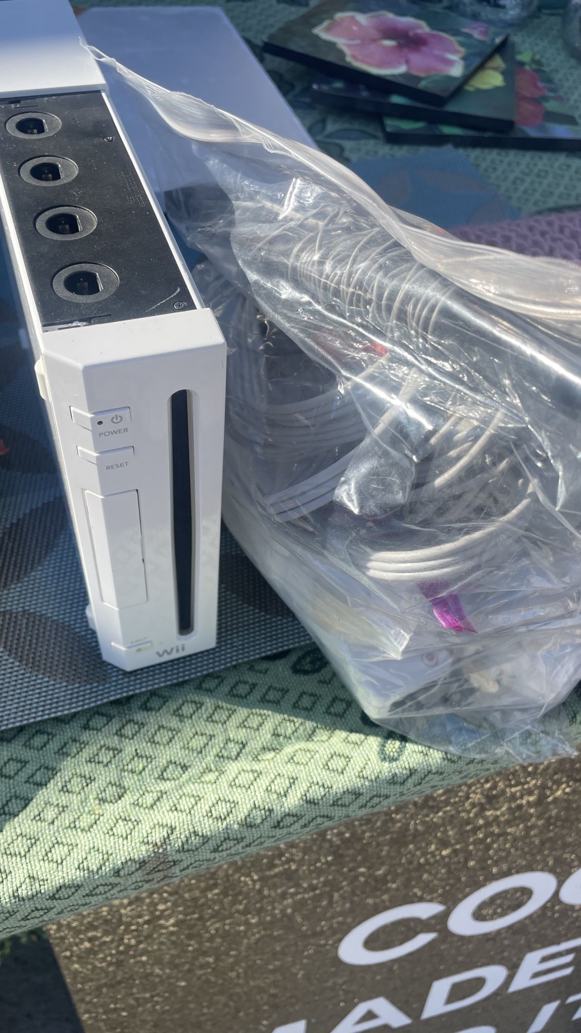 Wii Console + Remote + 2 Nunchuks