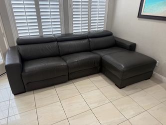 Dark gray leather sectional sofa