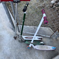 Three Razor Scooters 