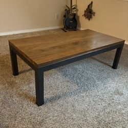 Heavy metal framed wood coffee table